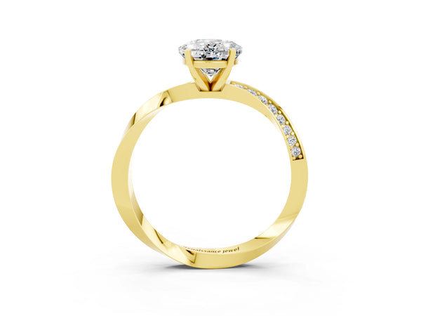 Yellow gold Oval Cut Moissanite Engagement Ring with Side Stone Accents and Four-Prong Setting