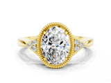 Yellow gold Oval Cut Moissanite Halo Ring with Tapered Band and Four-Prong Setting