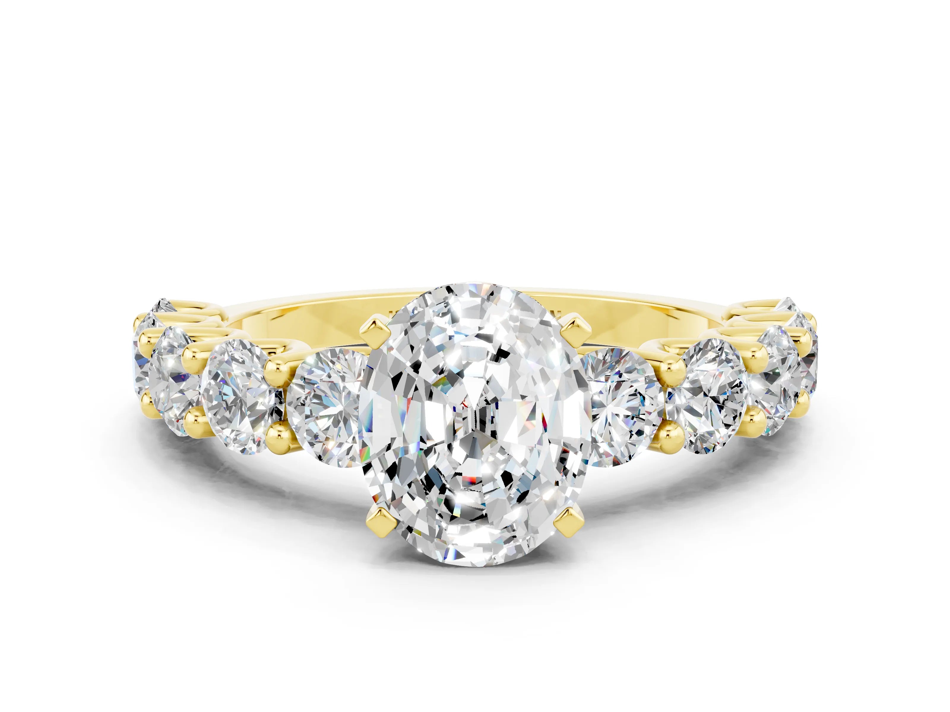 Yellow gold Oval Cut Moissanite Prong Setting with Side Stones on a Pave Band