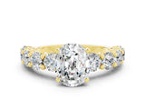 Yellow gold Oval Cut Moissanite Prong Setting with Side Stones on a Pave Band