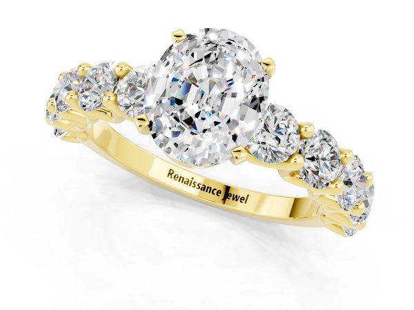 Yellow gold Oval Cut Moissanite Prong Setting with Side Stones on a Pave Band