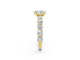 Yellow gold Oval Cut Moissanite Prong Setting with Side Stones on a Pave Band_2