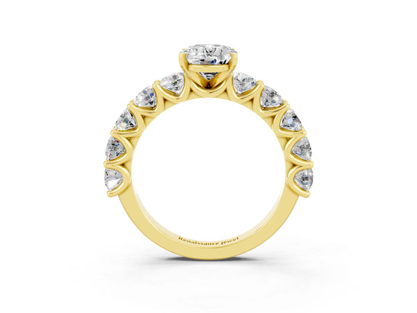 Yellow gold Oval Cut Moissanite Prong Setting with Side Stones on a Pave Band