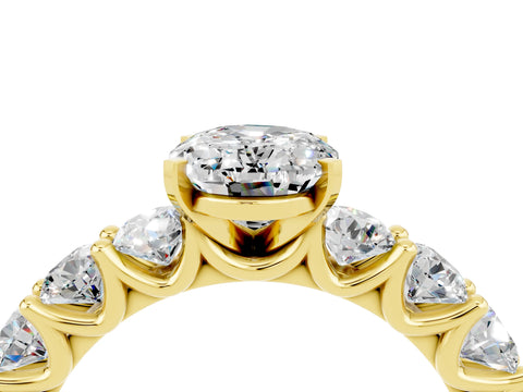 Yellow gold Oval Cut Moissanite Prong Setting with Side Stones on a Pave Band_4