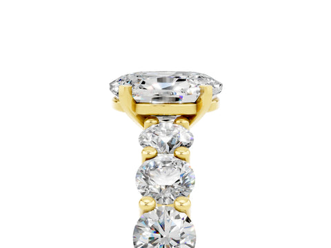 Yellow gold Oval Cut Moissanite Prong Setting with Side Stones on a Pave Band_5
