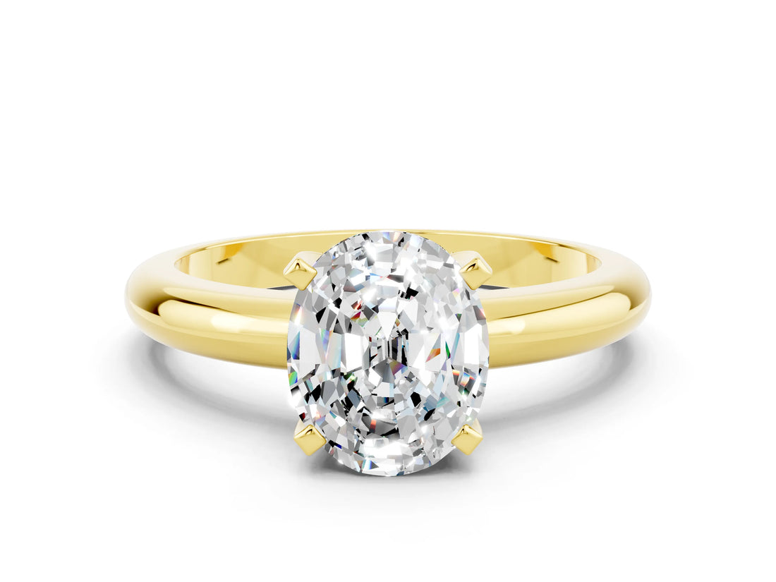 Yellow gold Oval Cut Moissanite Solitaire Engagement Ring with Round Band and Four-Prong Setting