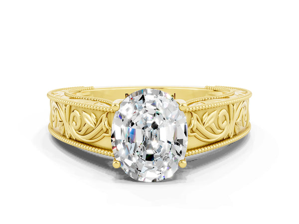 Yellow gold Oval Cut Moissanite Solitaire Ring with Engraved Band and Four-Prong Setting