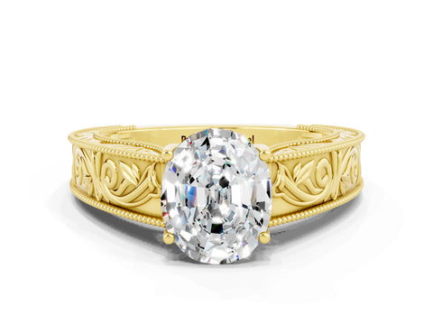 Yellow gold Oval Cut Moissanite Solitaire Ring with Engraved Band and Four-Prong Setting