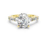 Yellow gold Oval Cut Moissanite Solitaire with Side Baguettes and Channel Set Band