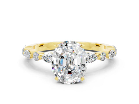 Yellow gold Oval Cut Moissanite Solitaire with Side Stones on a Pavé Band and Four-Prong Setting