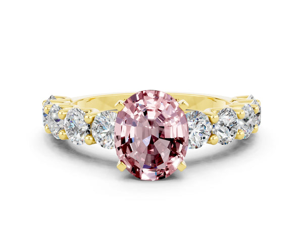 Yellow gold Oval Cut Morganite Prong Setting with Side Stones on a Pave Band
