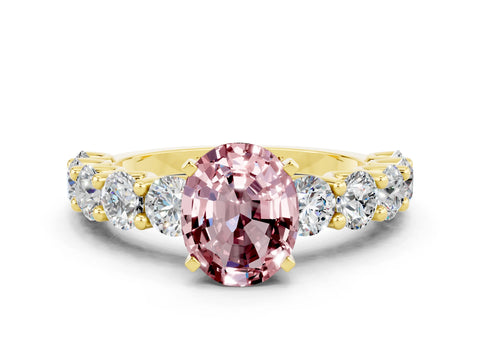 Yellow gold Oval Cut Morganite Prong Setting with Side Stones on a Pave Band