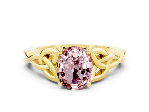 Yellow gold Oval Cut Morganite Solitaire Engagement Ring with Celtic Knot Band and Four-Prong Setting