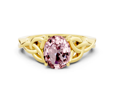 Yellow gold Oval Cut Morganite Solitaire Engagement Ring with Celtic Knot Band and Four-Prong Setting