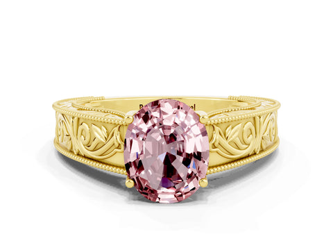 Yellow gold Oval Cut Morganite Solitaire Ring with Engraved Band and Four-Prong Setting