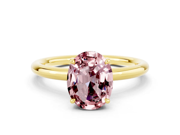 Yellow gold Oval Cut Morganite Solitaire Ring with Thin Band and Four-Prong Setting