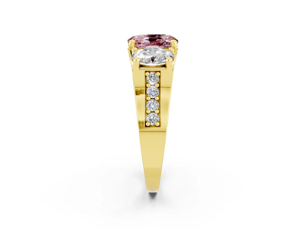 Yellow gold Oval Cut Morganite Three-Stone Ring with Channel Set Band and Four-Prong Setting