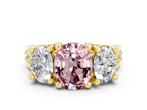 Yellow gold Oval Cut Morganite Three-Stone Ring with Channel Set Band and Four-Prong Setting