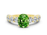Yellow gold Oval Cut Peridot Prong Setting with Side Stones on a Pave Band