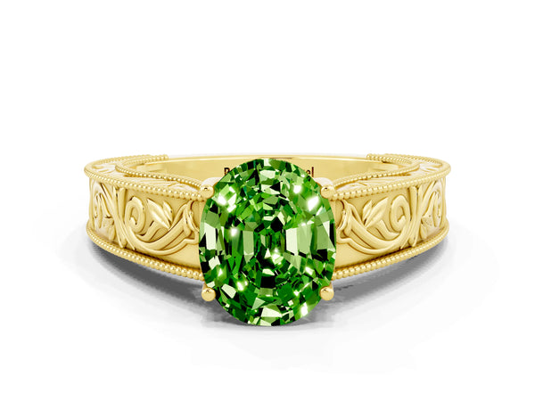 Yellow gold Oval Cut Peridot Solitaire Ring with Engraved Band and Four-Prong Setting