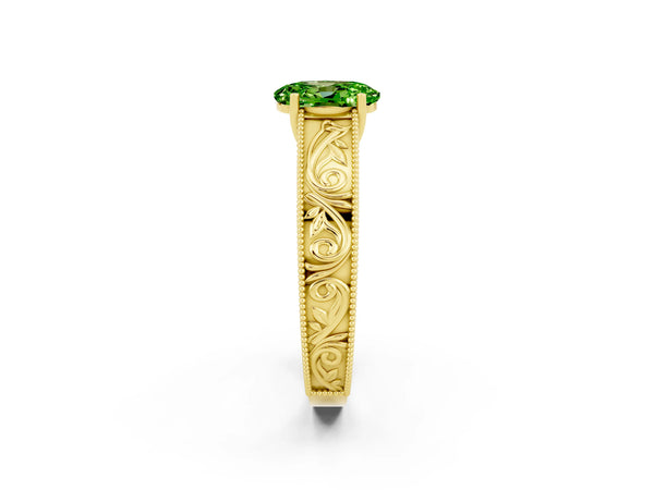 Yellow gold Oval Cut Peridot Solitaire Ring with Engraved Band and Four-Prong Setting