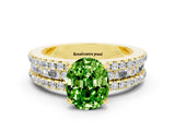 Yellow gold Oval Cut Peridot Solitaire Ring with Pavé and Channel Set Band