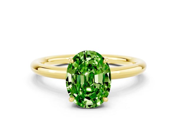 Yellow gold Oval Cut Peridot Solitaire Ring with Thin Band and Four-Prong Setting