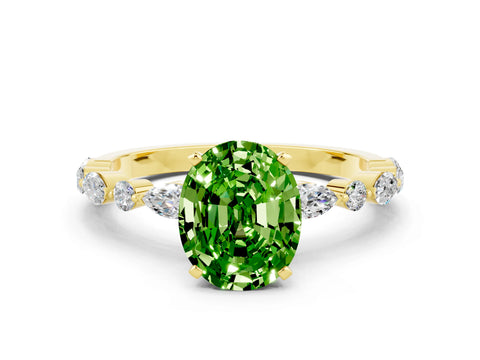 Yellow gold Oval Cut Peridot Solitaire with Side Stones on a Pavé Band and Four-Prong Setting