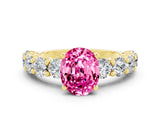 Yellow gold Oval Cut Pink Sapphire Prong Setting with Side Stones on a Pave Band_24