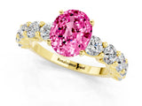Yellow gold Oval Cut Pink Sapphire Prong Setting with Side Stones on a Pave Band_25
