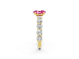 Yellow gold Oval Cut Pink Sapphire Prong Setting with Side Stones on a Pave Band_26