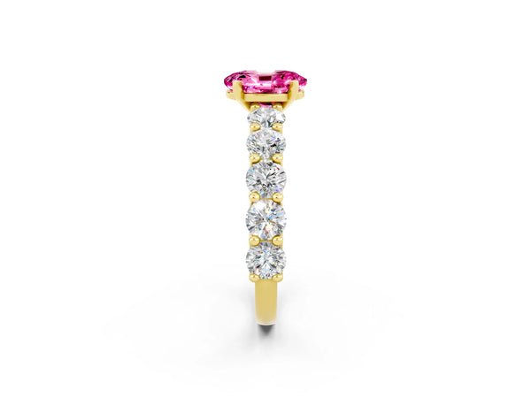 Yellow gold Oval Cut Pink Sapphire Prong Setting with Side Stones on a Pave Band