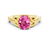 Yellow gold Oval Cut Pink Sapphire Solitaire Engagement Ring with Celtic Knot Band and Four-Prong Setting_24