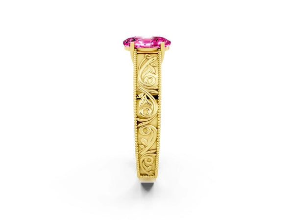 Yellow gold Oval Cut Pink Sapphire Solitaire Ring with Engraved Band and Four-Prong Setting