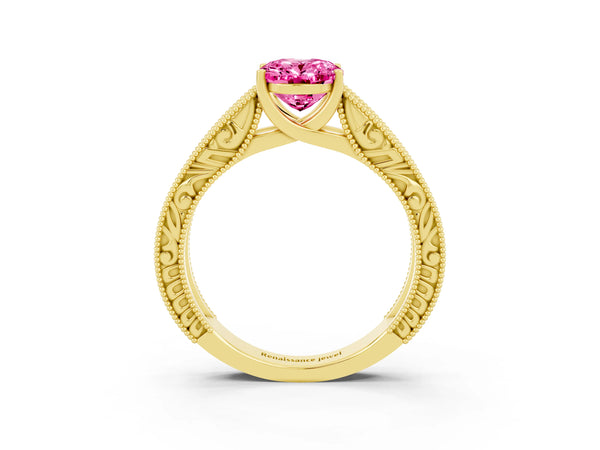 Yellow gold Oval Cut Pink Sapphire Solitaire Ring with Engraved Band and Four-Prong Setting