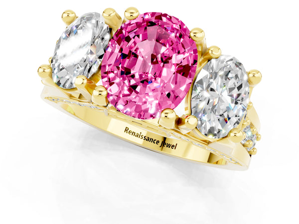 Yellow gold Oval Cut Pink Sapphire Three-Stone Ring with Channel Set Band and Four-Prong Setting