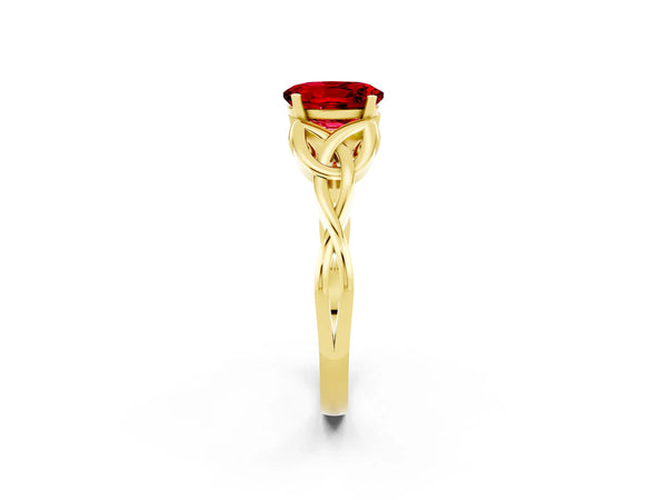 Yellow gold Oval Cut Ruby Solitaire Engagement Ring with Celtic Knot Band and Four-Prong Setting