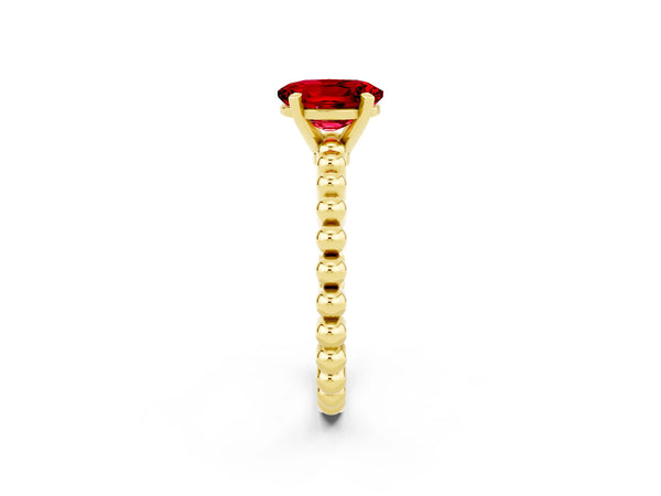 Yellow gold Oval Cut Ruby Solitaire Ring with Beaded Band and Prong Setting