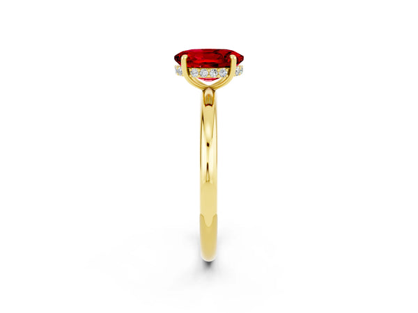 Yellow gold Oval Cut Ruby Solitaire Ring with Thin Band and Four-Prong Setting