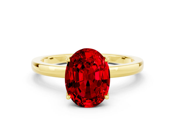 Yellow gold Oval Cut Ruby Solitaire Ring with Thin Band and Prong Setting