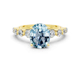 Yellow gold Oval Cut Solitaire Aquamarine Ring with Pave Band and Four-Prong Setting