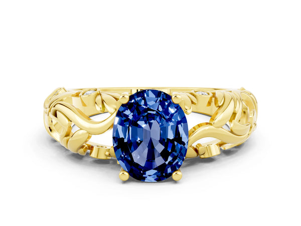 Yellow gold Oval Cut Solitaire Blue Sapphire Leaf-Inspired Vine Band Ring with Prong Setting