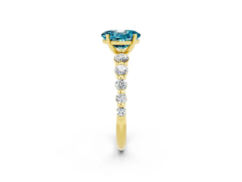 Yellow gold Oval Cut Solitaire Blue Topaz Ring with Pave Band and Four-Prong Setting_2