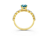 Yellow gold Oval Cut Solitaire Blue Topaz Ring with Pave Band and Four-Prong Setting_3