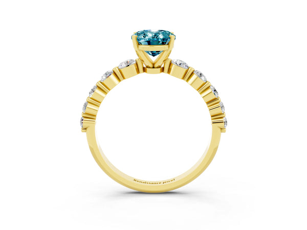 Yellow gold Oval Cut Solitaire Blue Topaz Ring with Pave Band and Four-Prong Setting