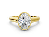 Yellow gold Oval Cut Solitaire Diamond Engagement Ring with Four-Prong Setting and Tapered Band_7