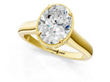 Yellow gold Oval Cut Solitaire Diamond Engagement Ring with Four-Prong Setting and Tapered Band_8