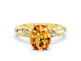 Yellow gold Oval Cut Solitaire Diamond Engagement Ring with Twisted Pave Band and Four-Prong Setting