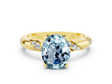 Yellow gold Oval Cut Solitaire Diamond Engagement Ring with Twisted Pave Band and Four-Prong Setting