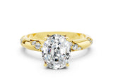 Yellow gold Oval Cut Solitaire Diamond Engagement Ring with Twisted Pave Band and Four-Prong Setting